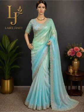 Brand new Dual shaded shimmer tissue shimmer tissue saree with stitched blouse